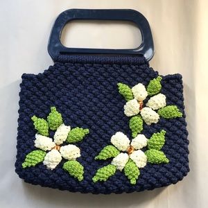 Crocheted handbag with floral detailing